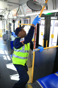 Image: VIA Maintenance Staff cleaning bus