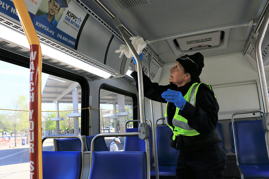 Image: VIA Maintenance Staff cleaning bus