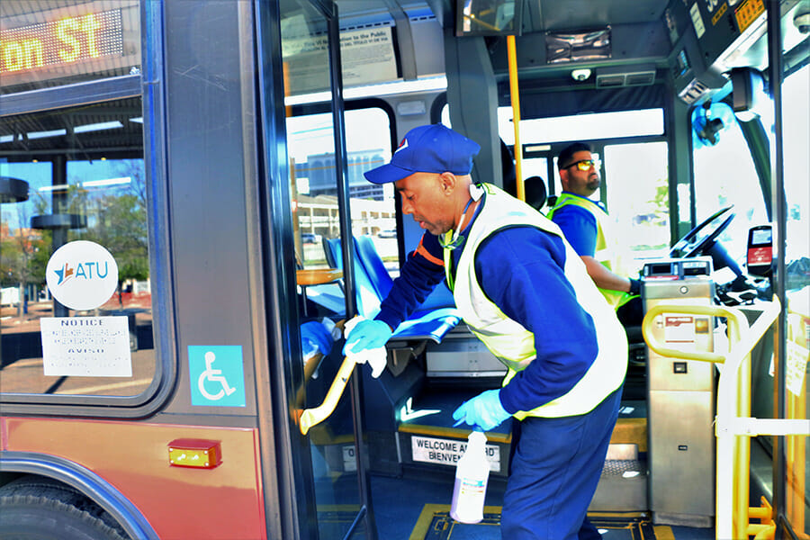 Image: VIA Maintenance Crew Cleaning Bus