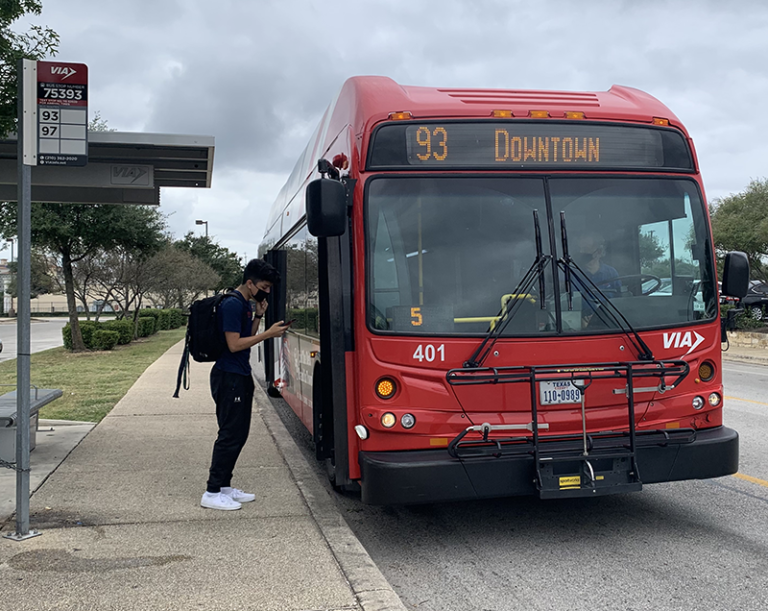 Image: Rider Boarding VIA Bus