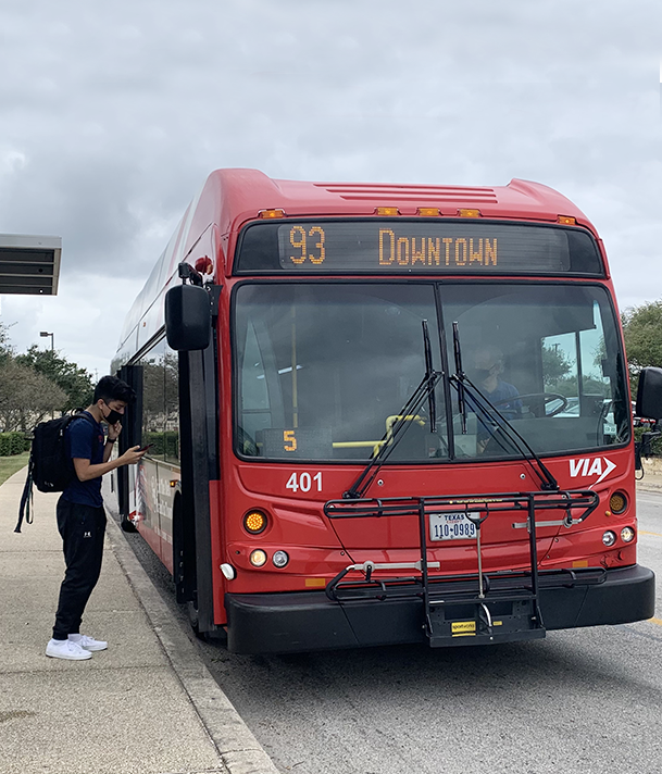 VIA Rider boarding bus