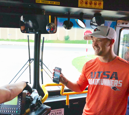 UTSA Fan using Park & Ride to the Alamodome.