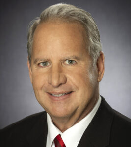 Trustee Louis Cooper