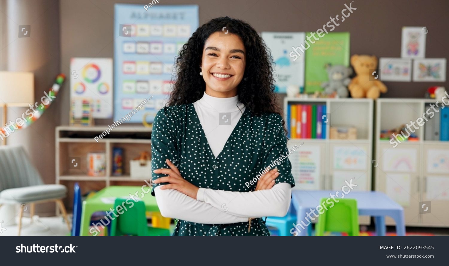stock-photo-woman-teacher-and-portrait-in-classroom-with-confidence-smile-and-montessori-about-us-educator-2622093545